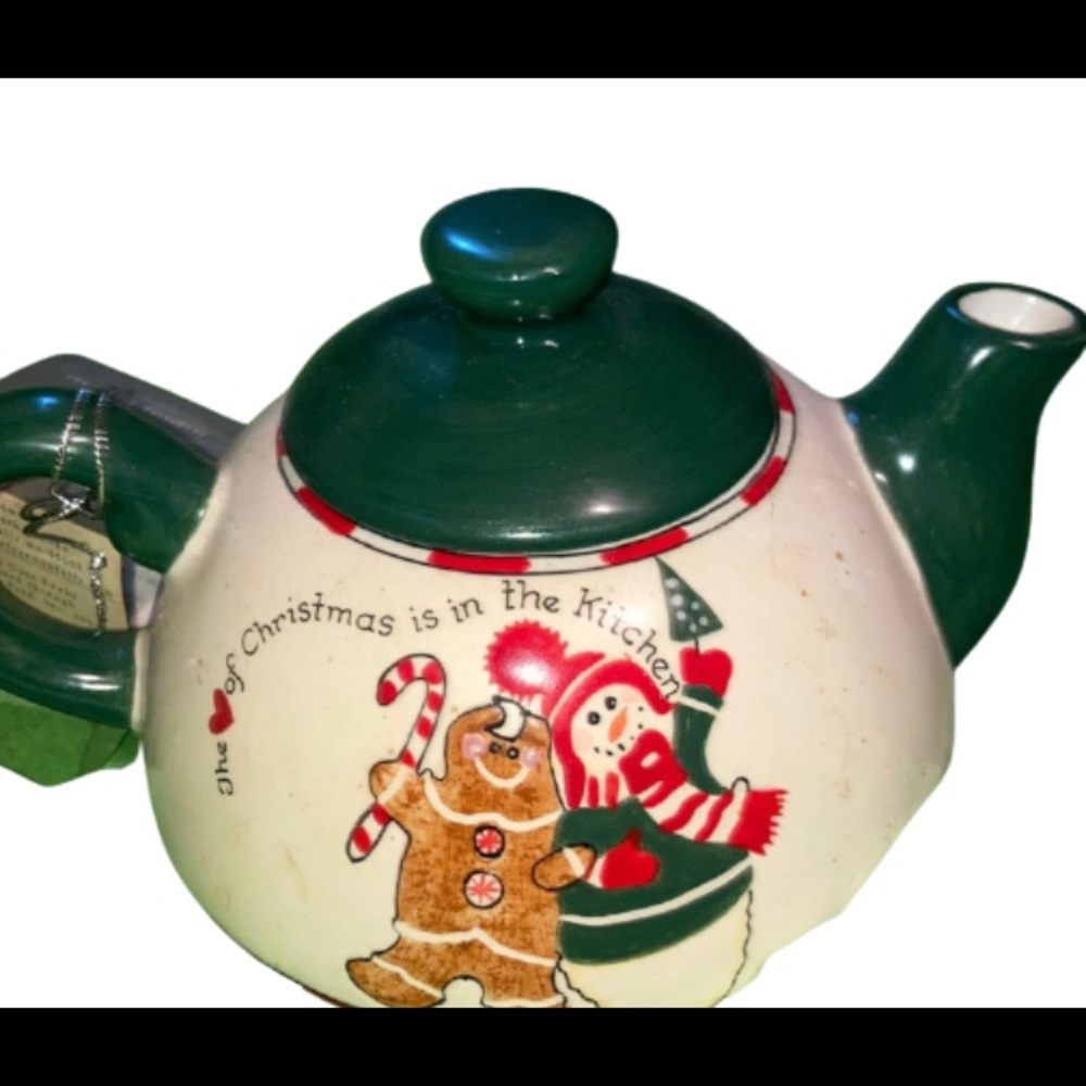 NWT Collectible Teapot that is seated on tea pot.